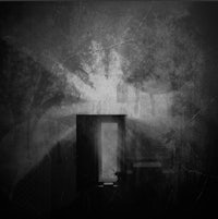 a black and white photograph of an open door
